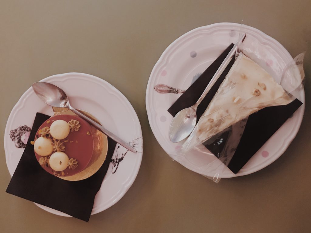 Two cakes on dark table. Top view