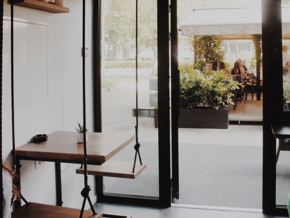Tables that instead of chairs have swings