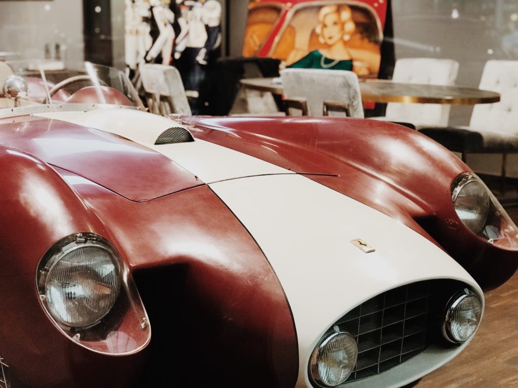 Red and white vintage Ferrari front side detail