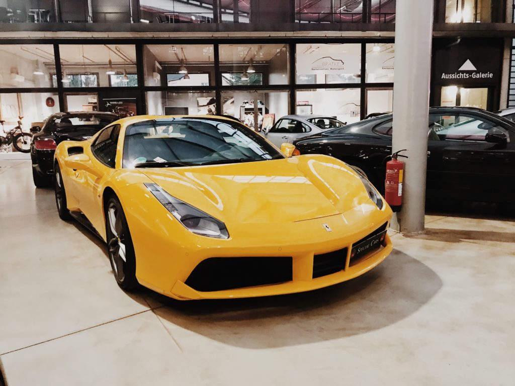Yellow Ferrari Italy in showroom