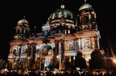 Berliner Dom illuminated by colorful images during Festival of Lights