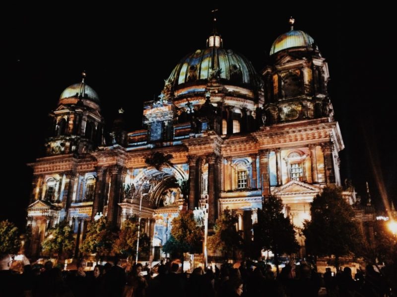 Berliner Dom illuminated by colorful images during Festival of Lights