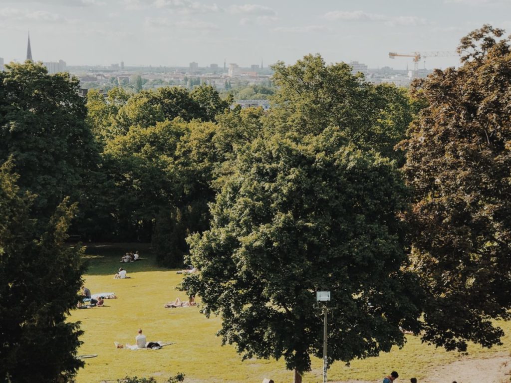 People sitting on the grass in Victoriapark, Berlin