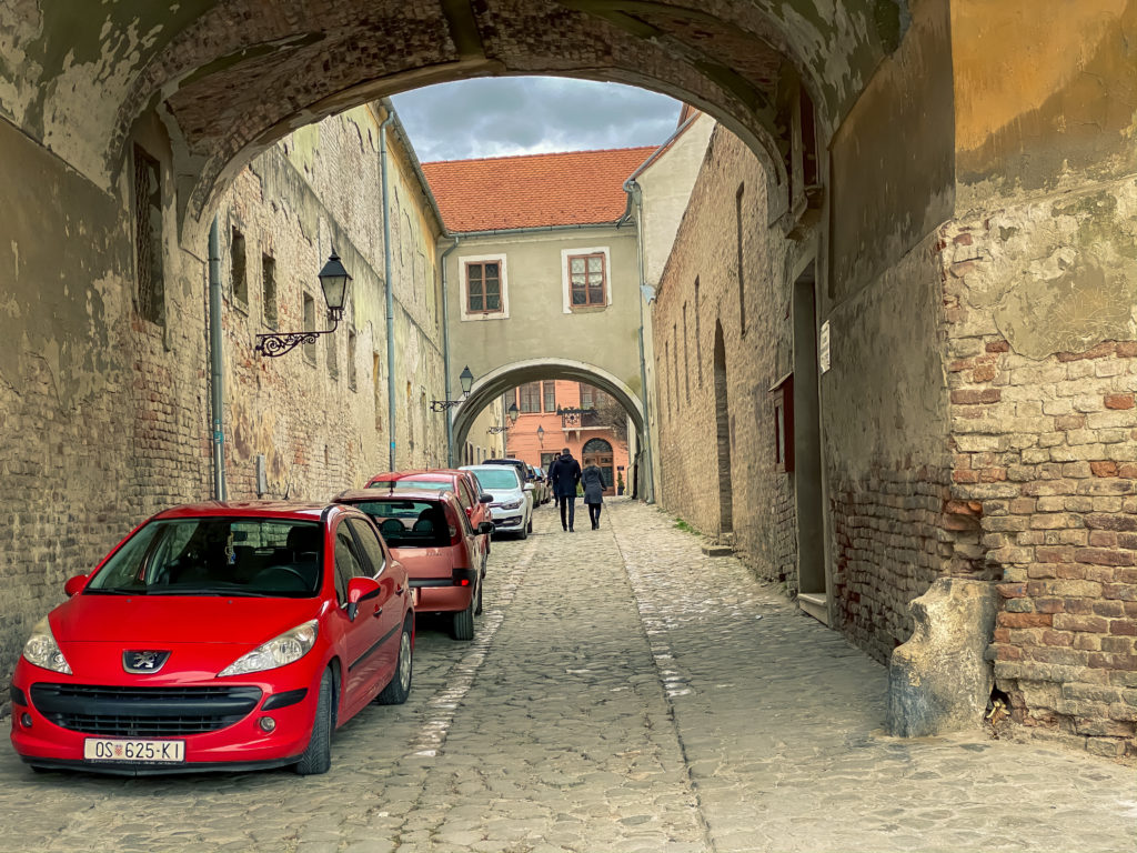 Tvrđa Osijek, the historic architecture with amazing Water Gate 8 Old paved street In Tvrđa, Historic Town Of Osijek, Croatia